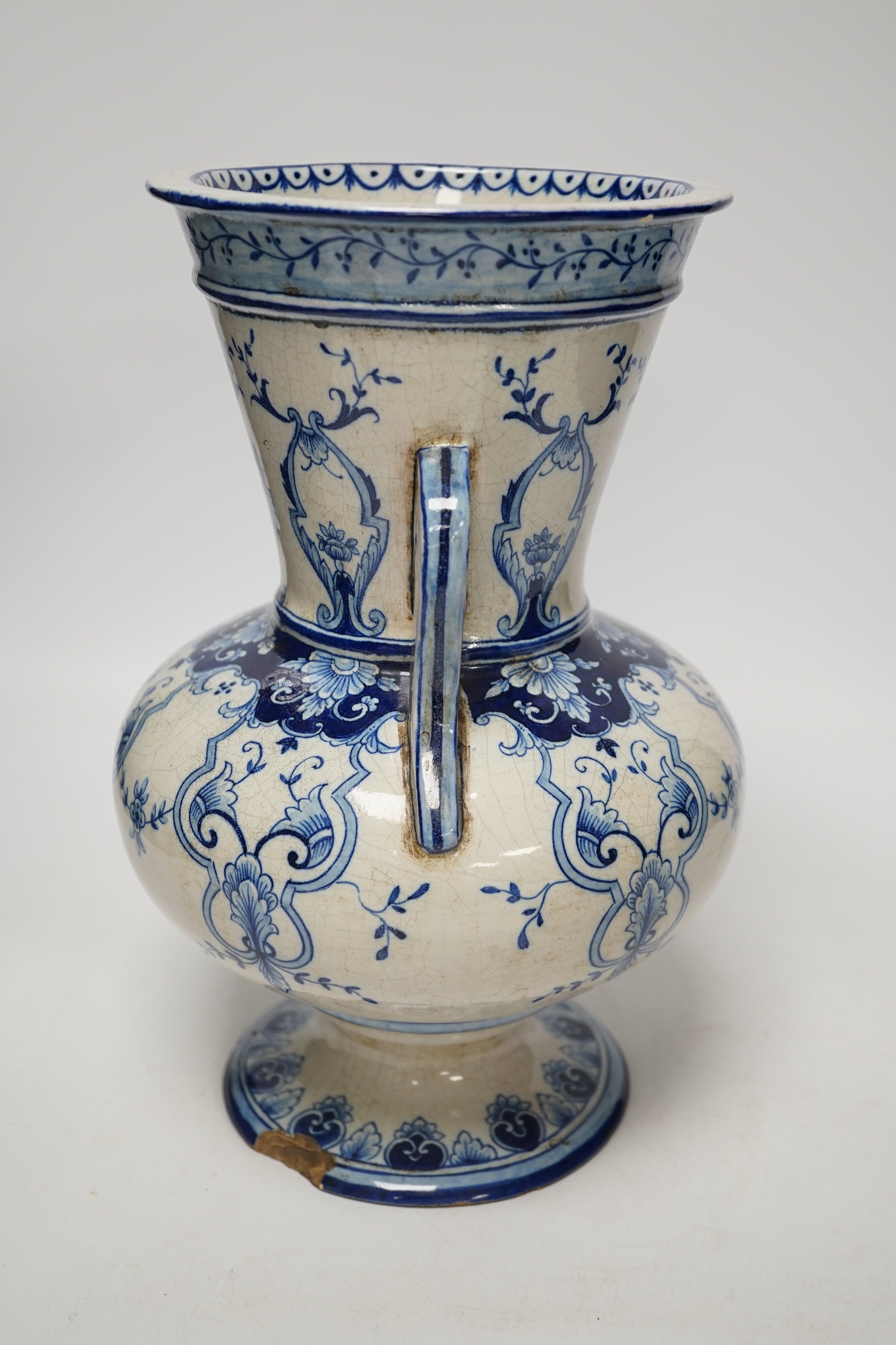 A Chinese blue and white jar and cover, Xuande mark, probably late Qing and a French faience vase (2) tallest 29.5cm